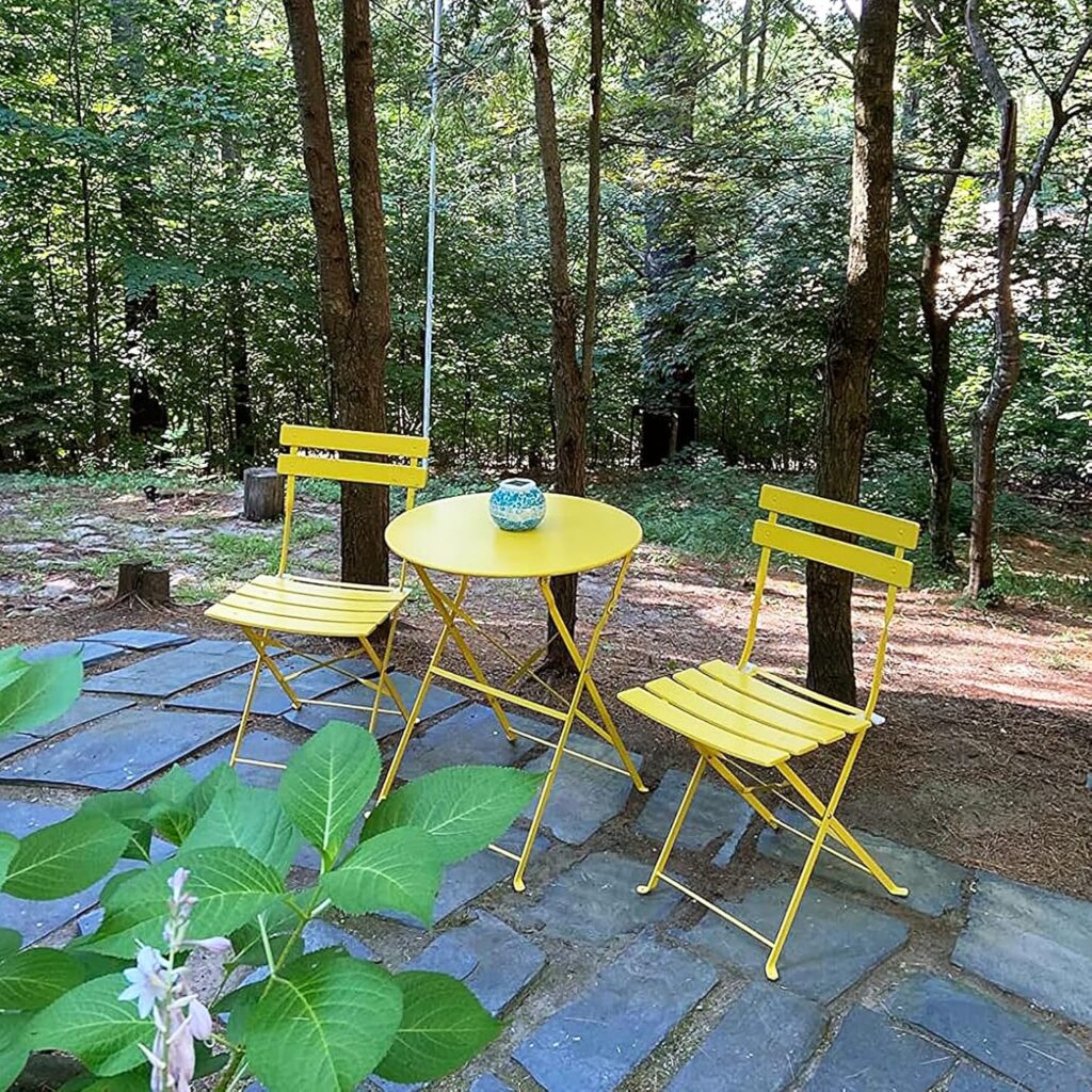 Yellow folding wrought iron 3-piece patio bistro set with two chairs and small table, compact outdoor furniture set for balconies, small patios, and indoor outdoor spaces
